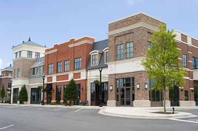 a street scene with focus on the side of a building